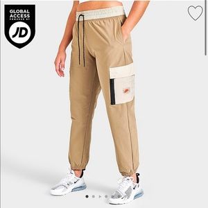 Nike cargo wind pants. Dark Driftwood/Rattan/Safety Orange.